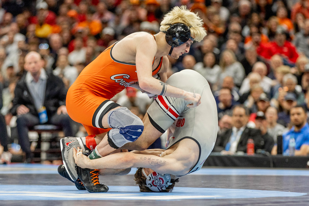 Jax Forrest controls Ben Davino of Ohio State during the 133-pound final at the 2026 NCAA Wrestling Championships at Rocket Mortgage Fieldhouse in Cleveland.