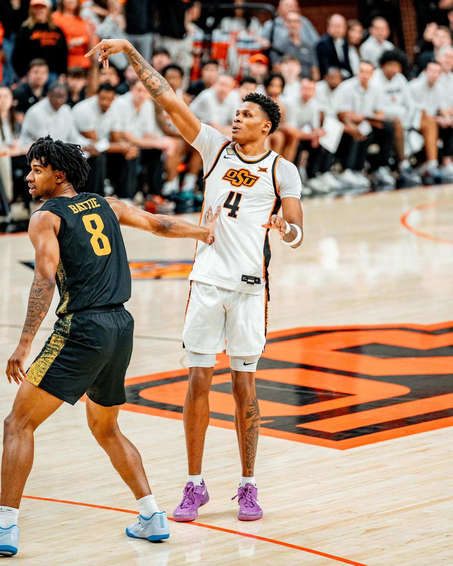 OSU forward Christian Coleman (4) follows through on a shot in a 96-70 NIT loss to Wichita State at Gallagher-Iba Arena. Coleman finished with 22 points, 10 rebounds. 