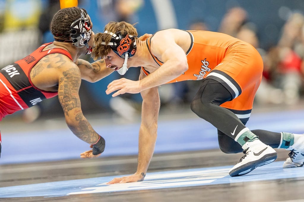 Oklahoma State's Troy Spratley wrestles NC State's Vincent Robinson in the 125-pound second round of the 2026 NCAA Wrestling Championships.
