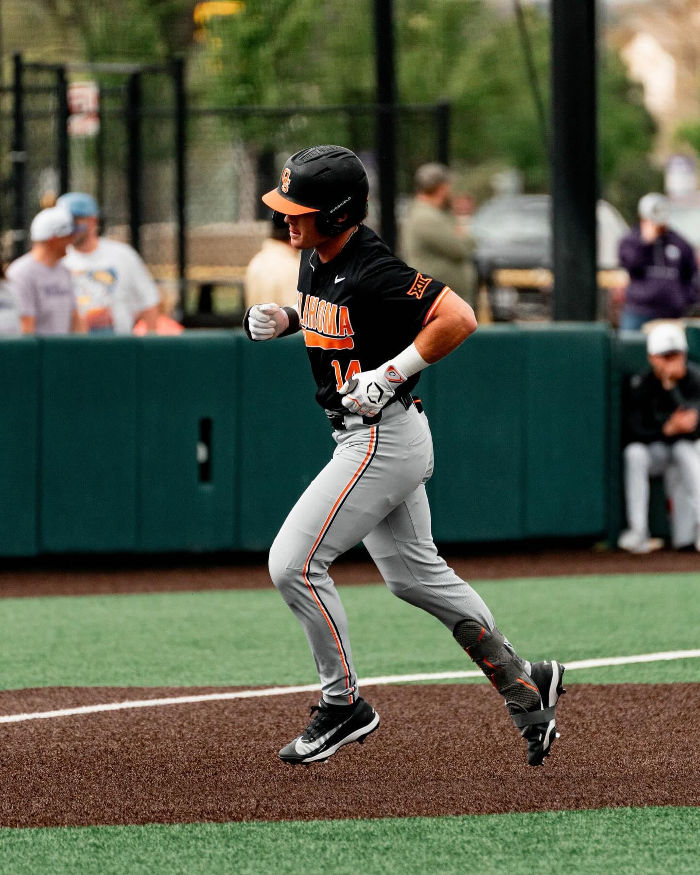 Alex Conover (14) runs the bases after a solo home run in the first inning of OSU's 13-9 loss to Kansas State on April 11, 2026, at Tointon Family Stadium.