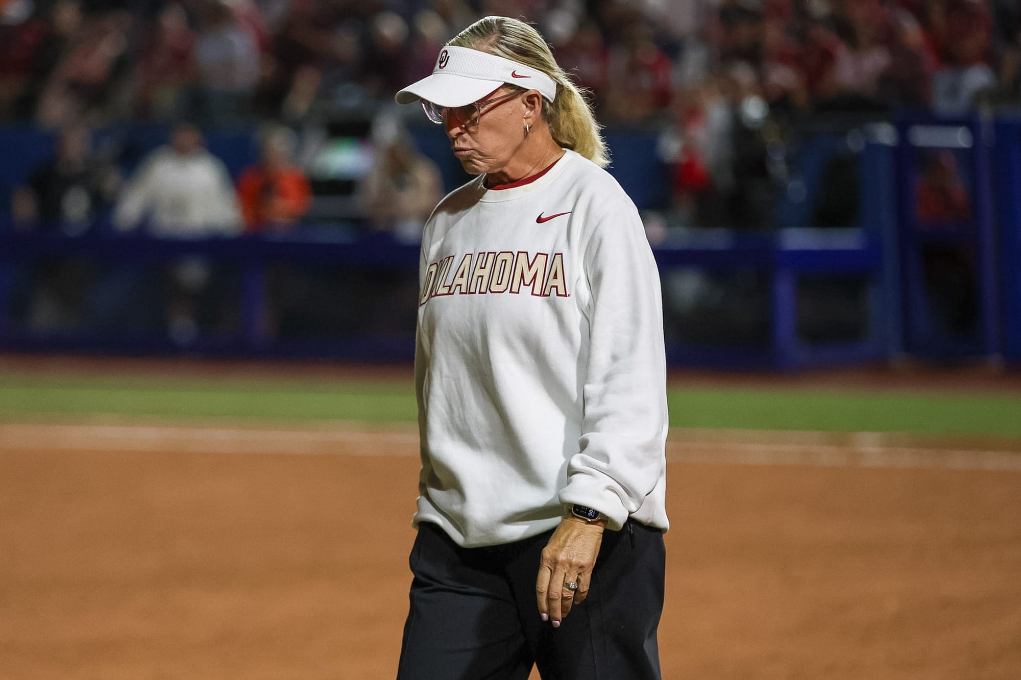 Oklahoma head coach Patty Gasso walks the field during the Sooners' 6-4 loss to No. 19 Oklahoma State at Devon Park in Oklahoma City.