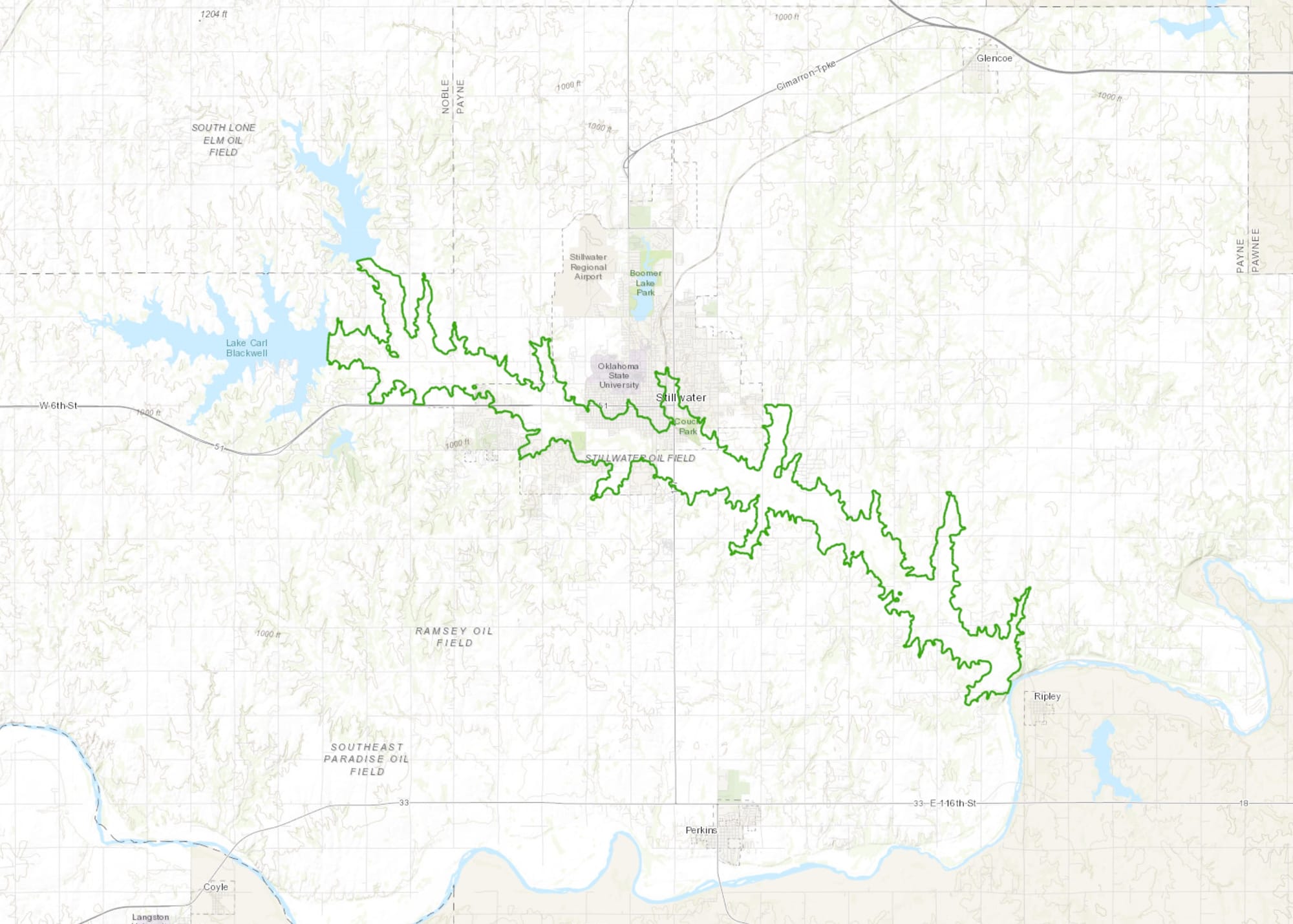 A topographic map showing Lake Carl Blackwell at left and a green boundary outlining the dam breach inundation zone, which extends eastward through Stillwater, past OSU's campus, and downstream along Stillwater Creek to Ripley.