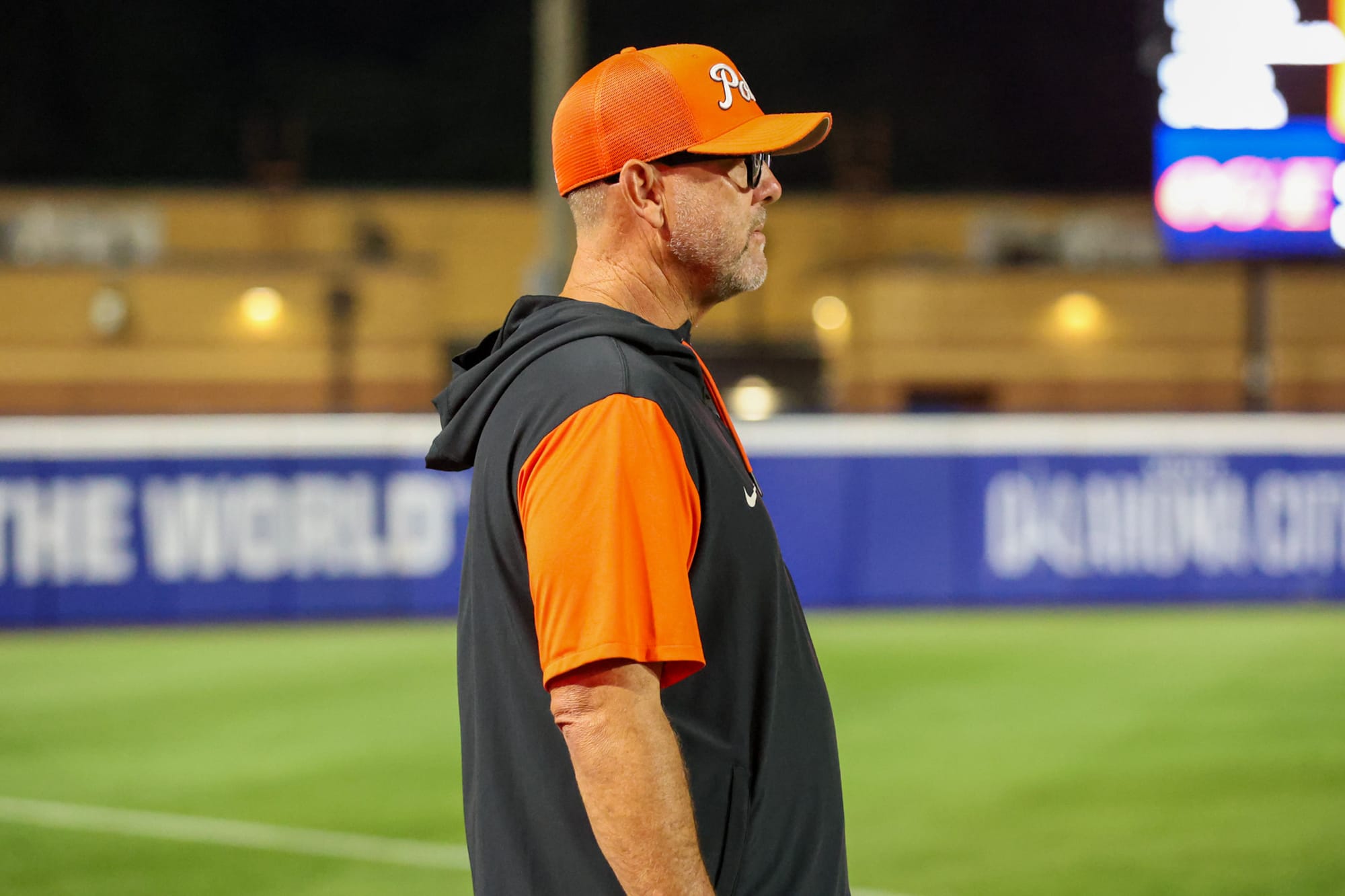Oklahoma State head coach Kenny Gajewski watches from the field during the Cowgirls' 6-4 win against top-ranked Oklahoma at Devon Park in Oklahoma City.