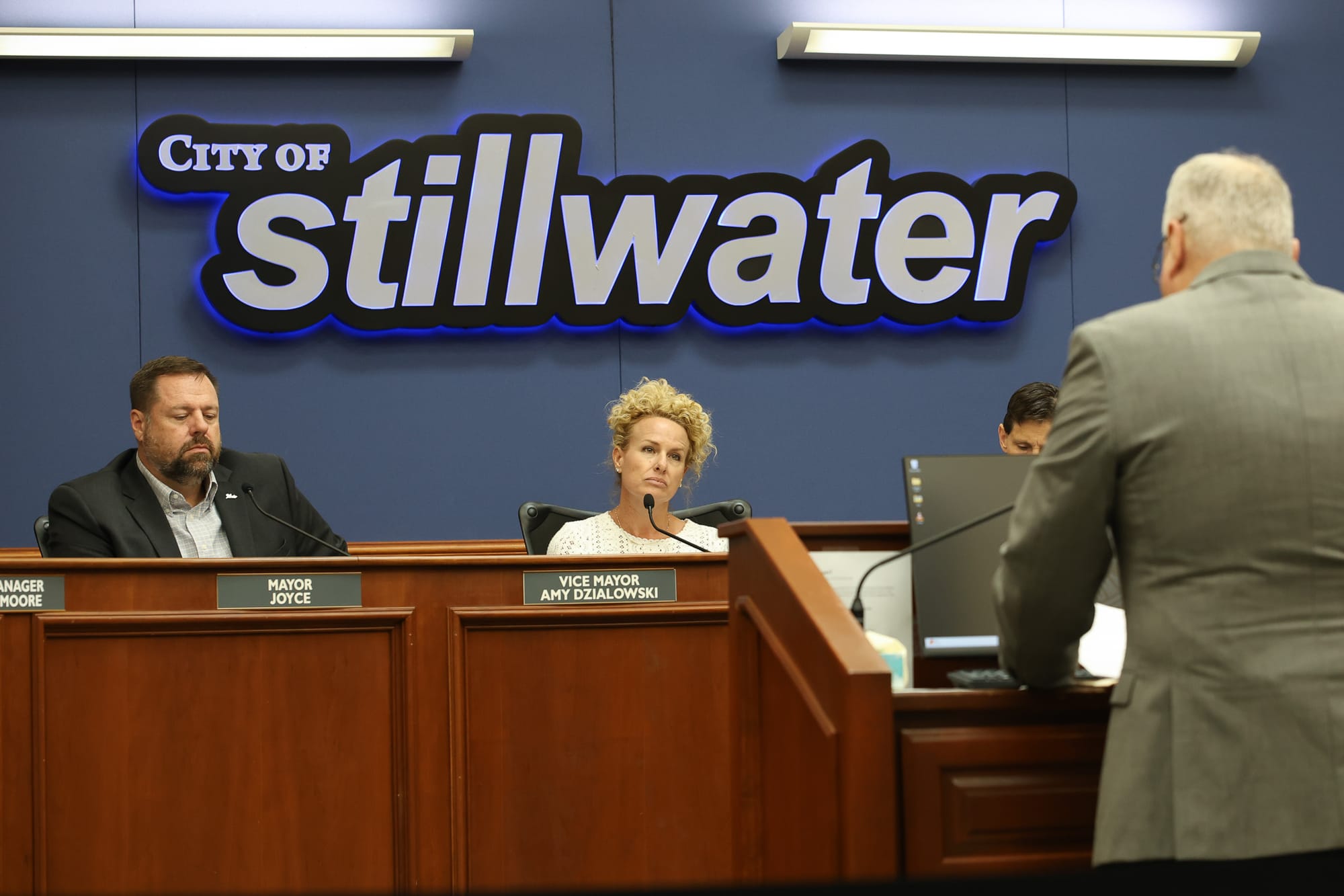 Loren Smith, SUA electric utility director, presents the renewable energy certificate rate to Chair Will Joyce and Vice Chair Amy Dzialowski at the Aug. 3, 2026 meeting.