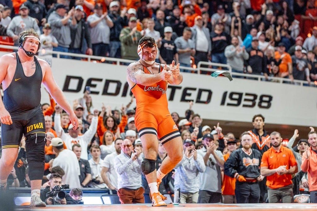 Doucet's pin paps dominant OSU effort — Cowboys rout No. 7 Iowa 32-11 in historic dual