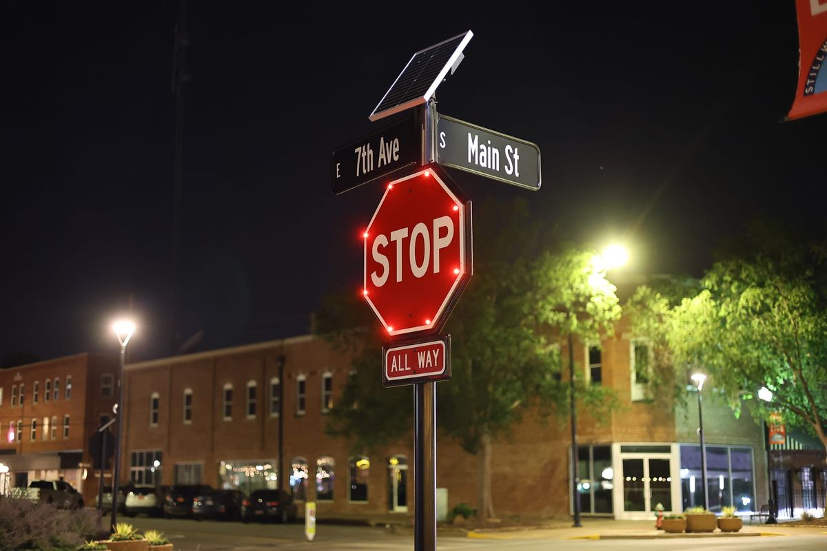 Pedestrian lights going up on Main Street. The roundabout is next.