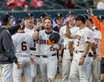 OSU junior centerfielder Kollin Ritchie (13) celebrates with teammates after a home run against Vanderbilt on Sunday, Feb. 15, 2026, at O'Brate Stadium in Stillwater.