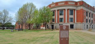 Looking at the Payne County Courthouse building from the North East corner of the lot at 606 South Husband St.