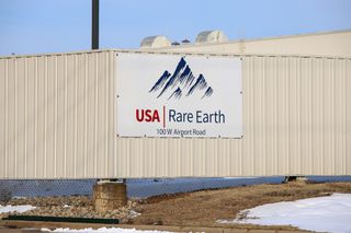 Entrance sign for USA Rare Earth magnet manufacturing facility in Stillwater.