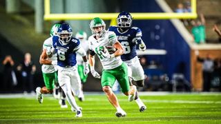 North Texas wide receiver Wyatt Young runs with the ball during a game against Rice. Young set an American Conference record with 295 receiving yards in UNT's 56-24 win Nov. 22, 2025.