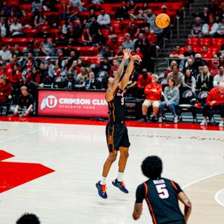 Oklahoma State guard Anthony Roy shoots a three point shot during Cowboys' 81-69 road victory over Utah Saturday at Jon M. Huntsman Center in Salt Lake City.