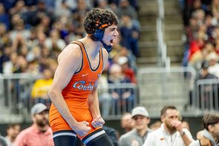 OSU freshman Sergio Vega celebrates his 141-pound NCAA Championship win over Ohio State's Jesse Mendes in Cleveland on March 21, 2026.