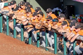 Oklahoma State Cowboys watch from the dugout during the Big 12 Baseball Tournament against Kansas on May 22, 2026, at Surprise Stadium in Surprise, Ariz.