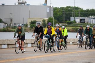 A group of cyclists crosses the Lakeview Road bridge over Boomer Lake during Stillwater's Ride of Silence on May 20, 2026.