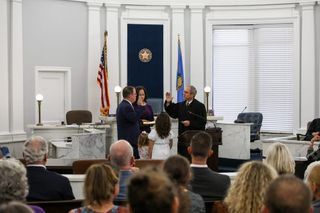 Jeremiah Gregory raises his right hand as Judge Robert Hudson administers the oath of office July 31, 2026, in the Payne County Courthouse in Stillwater, as his family looks on.