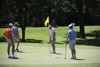 Former OSU football head coach Mike Gundy putts on the 13th hole during the Pioneer PlayDay golf tournament Monday, July 20, at Stillwater Country Club.