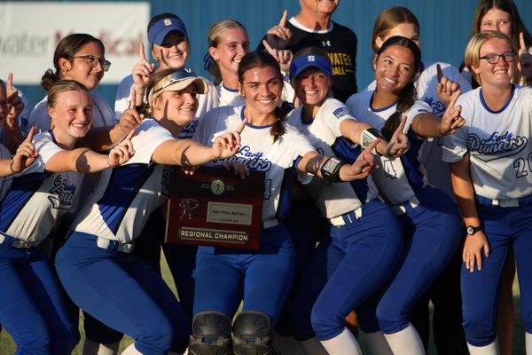 Lady Pioneers Survive Epic Slugfest, Win Regional Title in Extra Innings