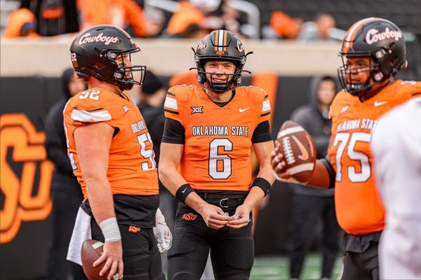Oklahoma State quarterback Zane Flores smiles during the Cowboys' game against Iowa State at Boone Pickens Stadium.