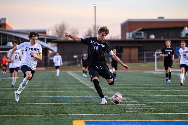 Stillwater senior Graham Condley (10) strikes toward goal during the Pioneers' 3-0 shutout of OKC Storm on March 24, 2026, at Pioneer Stadium.