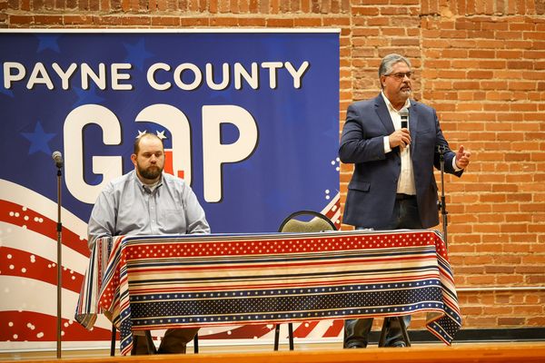 Rep. Dillon Travis listens as challenger Kevin Wright speaks at the Payne County GOP candidate forum on June 11, 2026, at the Stillwater Community Center in Stillwater.