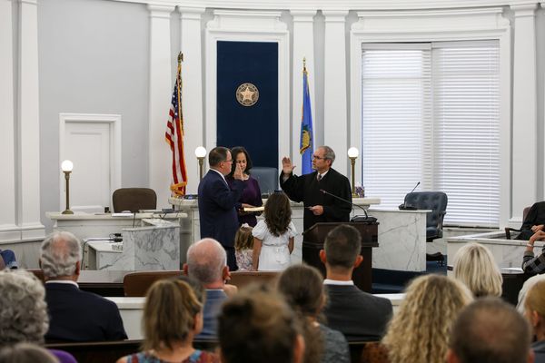 Jeremiah Gregory raises his right hand as Judge Robert Hudson administers the oath of office July 31, 2026, in the Payne County Courthouse in Stillwater, as his family looks on.