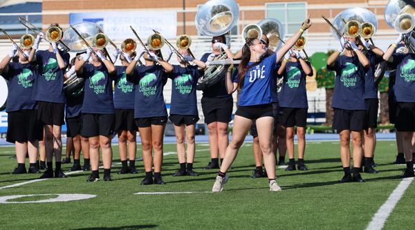 Stillwater color guard member Cammy Booth performs in front of the Pioneer Marching Band at the Deer Creek Marching Invitational on Saturday, Sept. 19, 2026, in Edmond.
