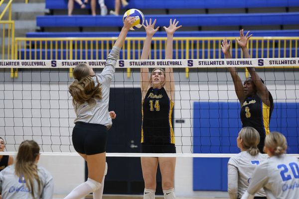 Stillwater's Jessica Fahlenkamp and Nyla Patterson block a Sapulpa attack for Fahlenkamp's 200th career block on Oct. 1, 2026, at Pioneer Fieldhouse in Stillwater.