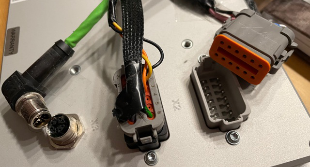 One M12 connectors for Ethernet, two 12-pin Deutsch connectors for 2x CAN, 1x USB, 1x RS232 and power