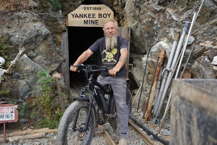 Frank Schlichting riding the rails at the Yankee Boy Mine, Grand Forks, British Columbia 