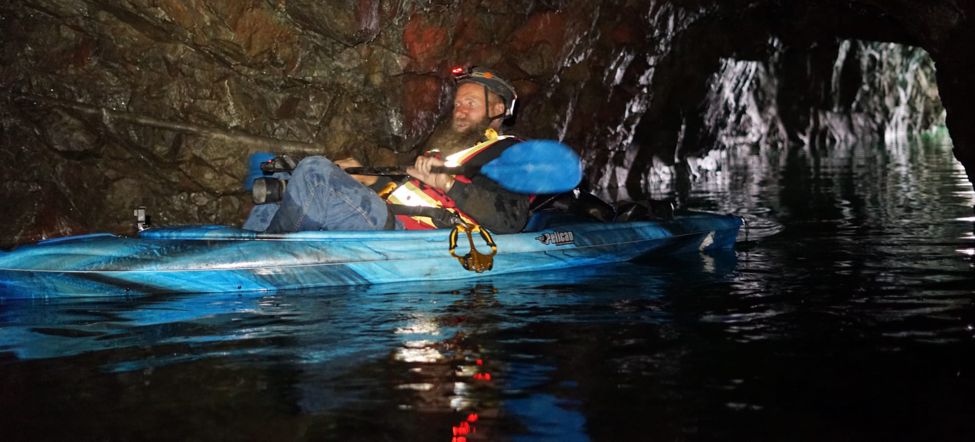 Frank Schlichting exploring flooded Union mine, British Columbia 