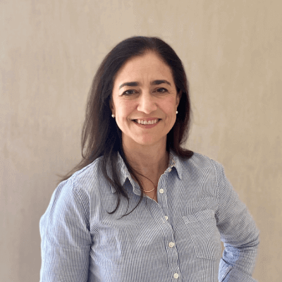 A headshot of Ana Saldaña.