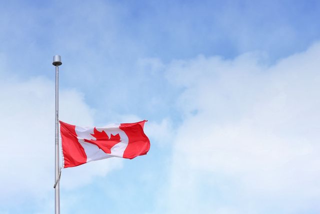 Canadian flag at half mast.