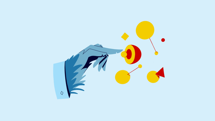 A feathered hand sticking out of a men's dress shirt sleeve, pointing toward bits and bobs reminiscent of building blocks.