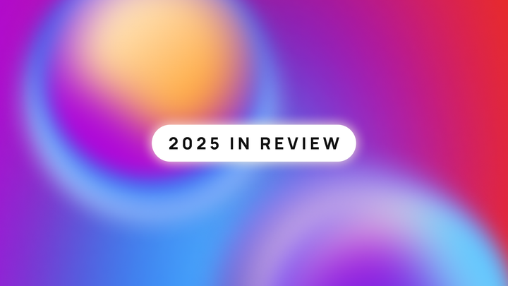 2025 in review on a purple, blue, yellow, and red orb background.