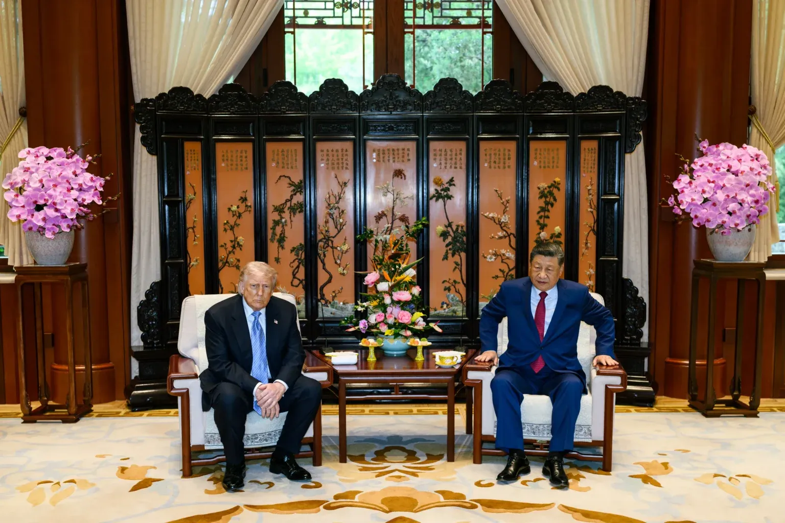 Photo of Donald Trump and Xi Jinping seated in lavish Chinese setting in Beijing, May 15, 2026.
