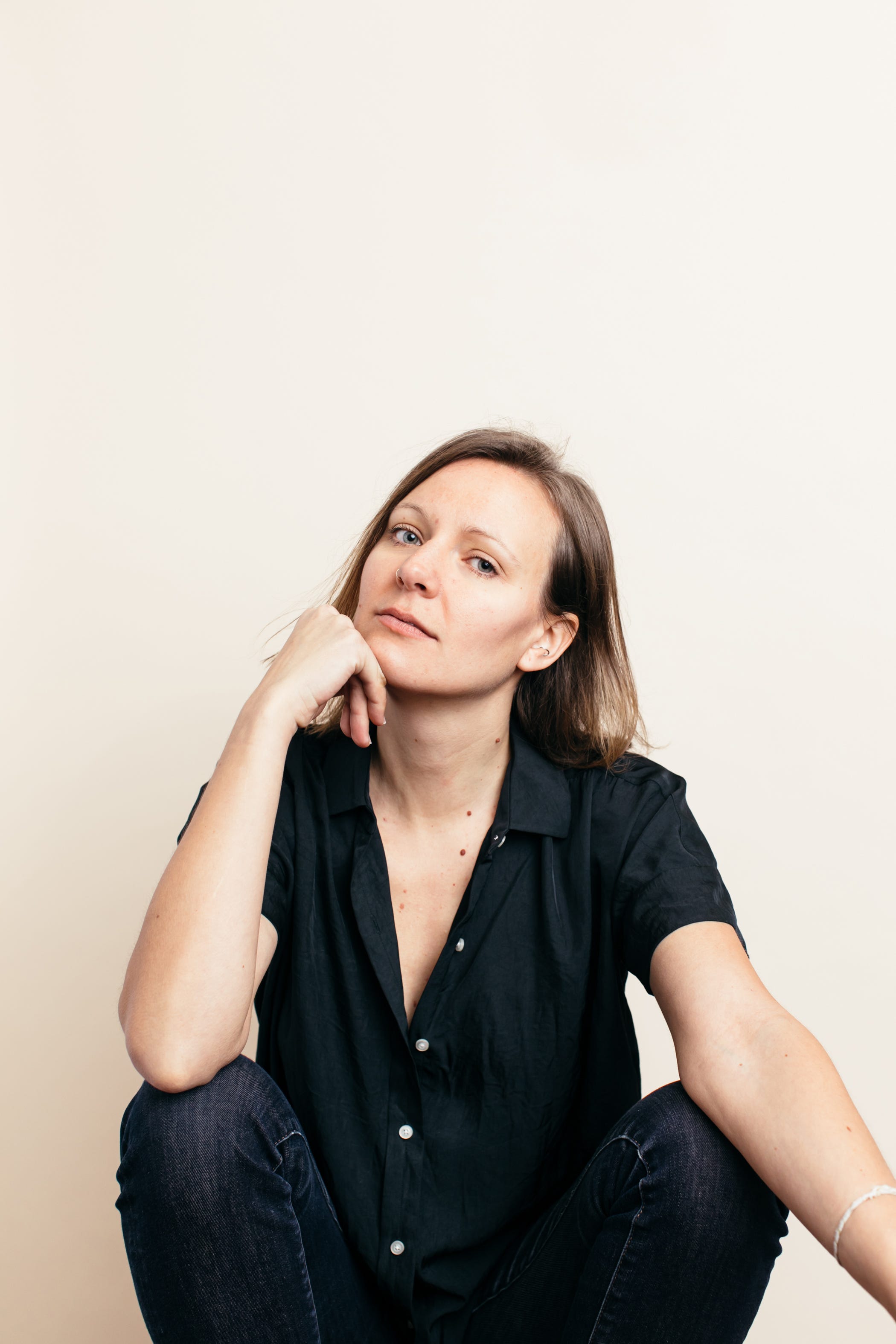 Headshot of today's guest, Hillary McBride, sitting against a white background