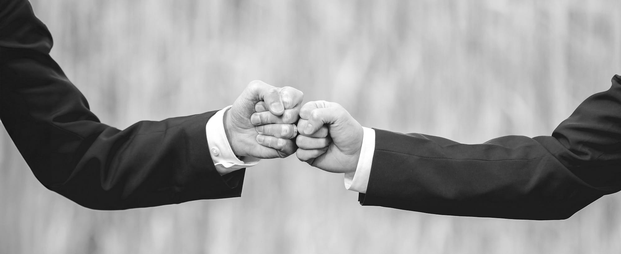 a couple of people that are holding hands