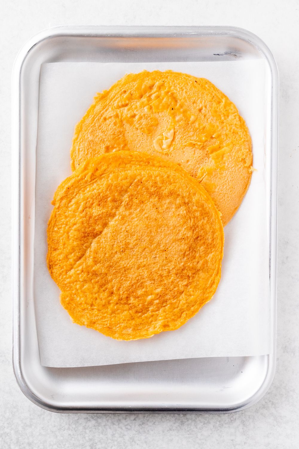 Gluten-free egg wraps on a silver tray