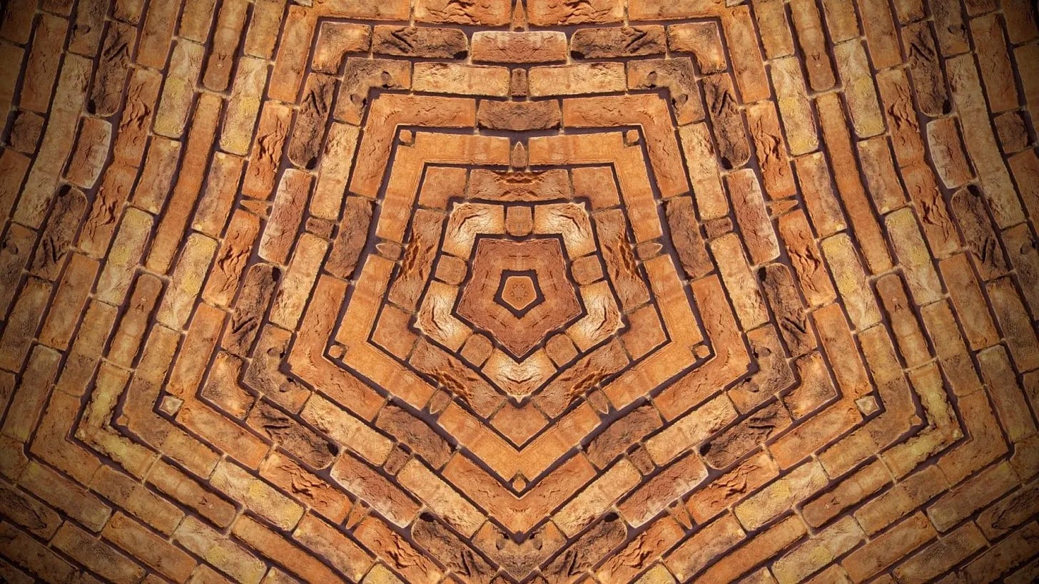 Bricks arranged in a pentagonal pattern representing how each experience creates a path to our core identities and opinions.
