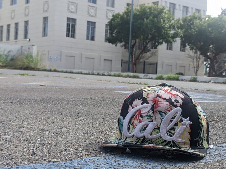 Photograph of a hat on the street near old City Hall in Hayward.