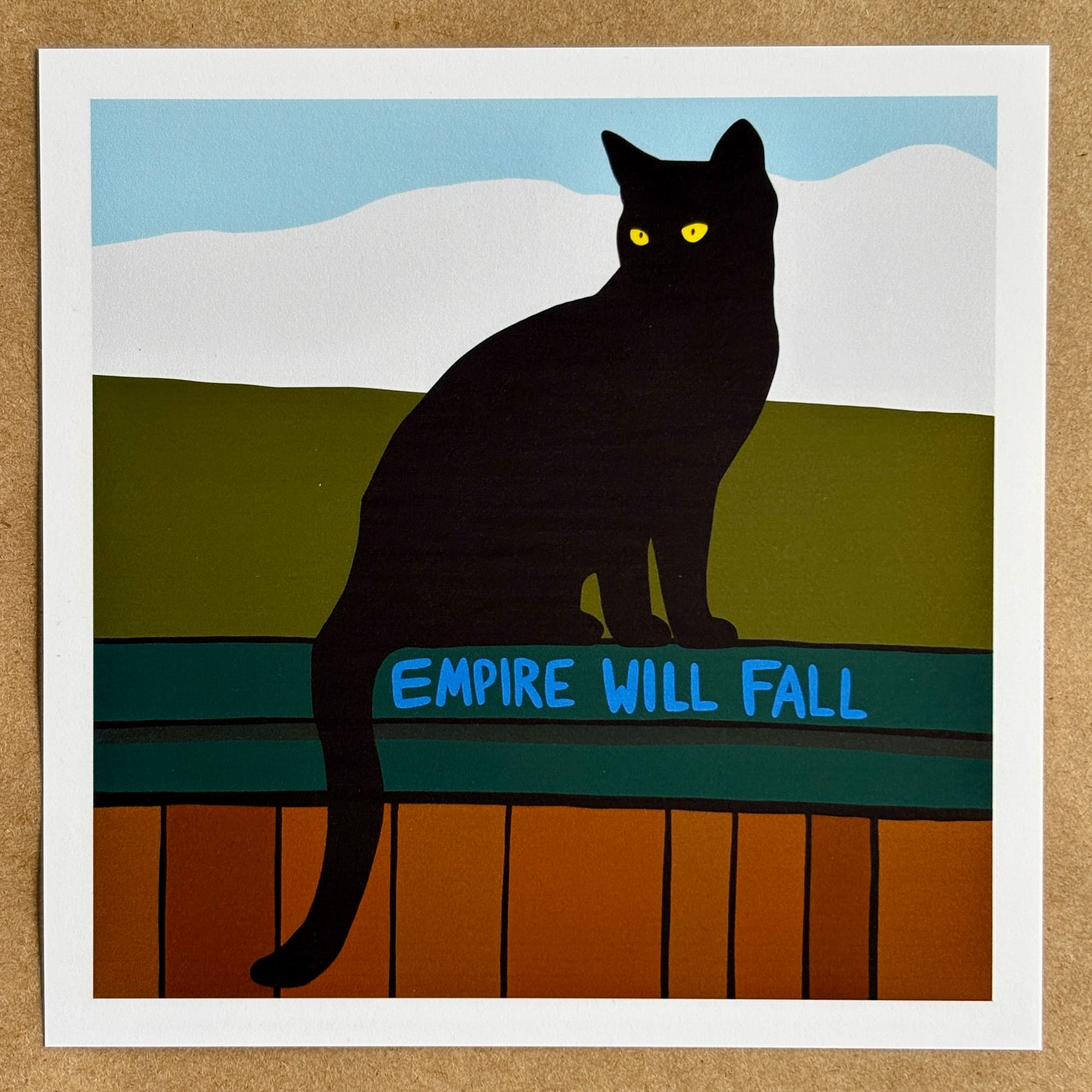 Original art by AnneArchy of a black cat sitting on a fence with hand-lettering of the words "empire will fall" on the fence. 