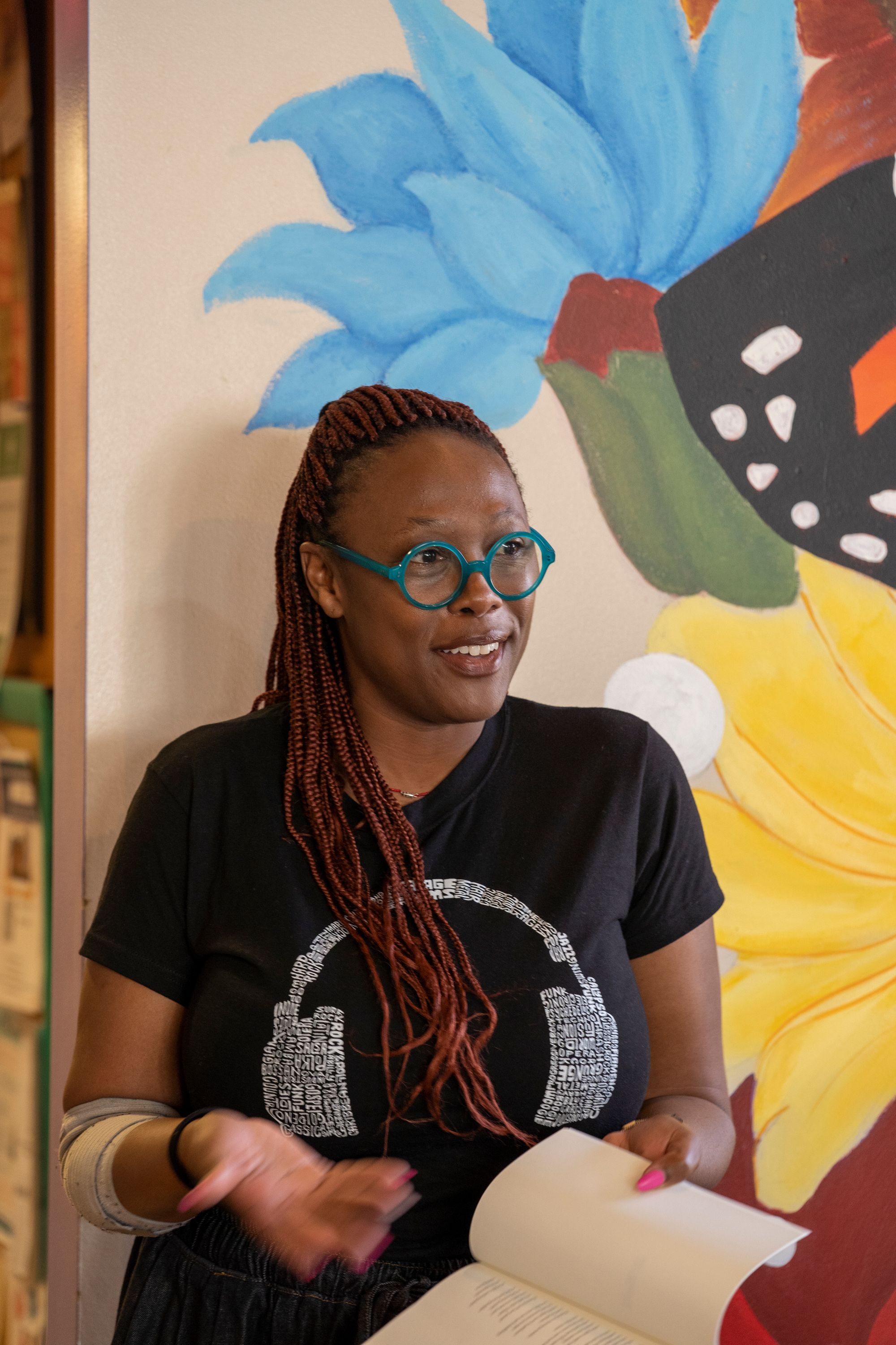 Image of a woman with a book in hand