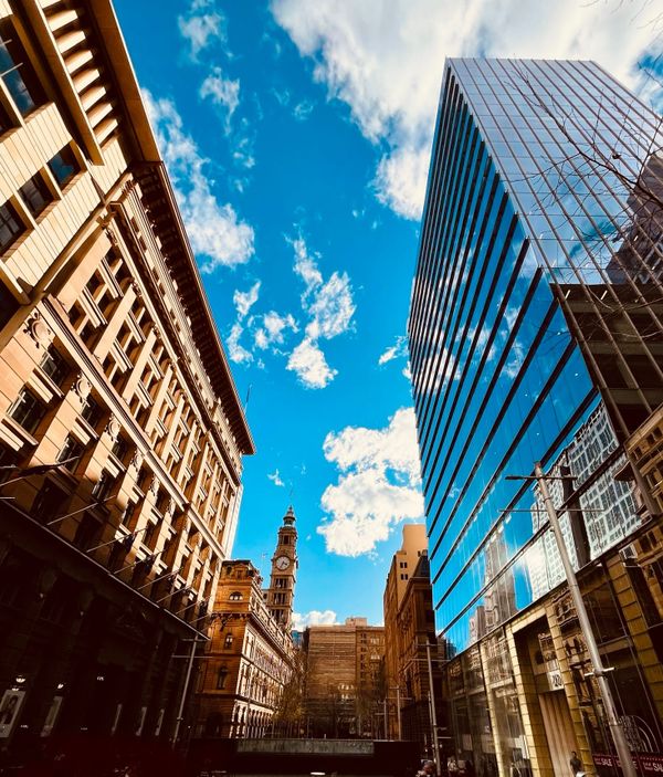 A clear blue sky between buildings in the Sydney CBD. Photo by me.