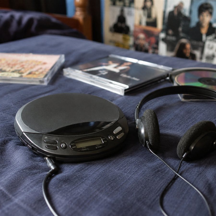 A portable CD player with wired earbuds