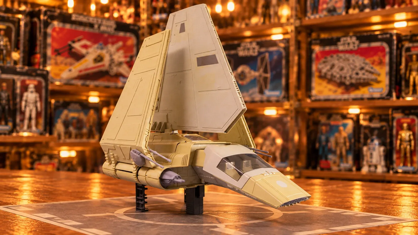 Illustration of the vintage Kenner Imperial Shuttle toy in a toy-store display.