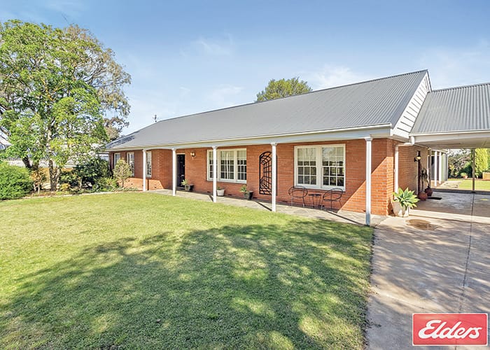 Stunning brick home in tranquil setting