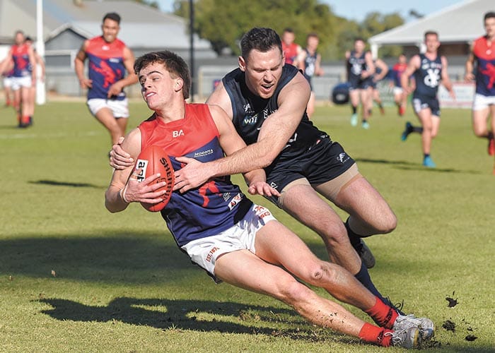 Cougars cement top spot