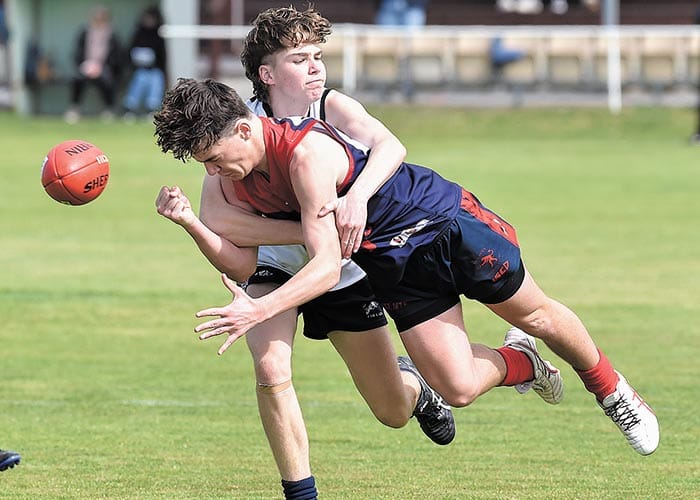 Cougars claw Demons