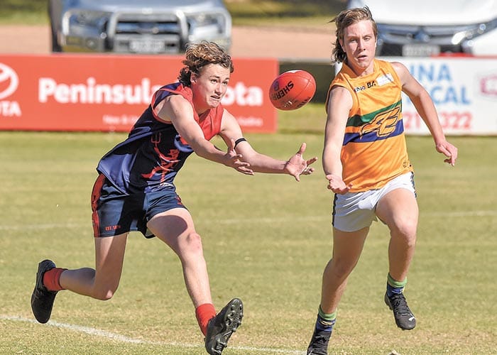 Demons fend off persistent Eagles