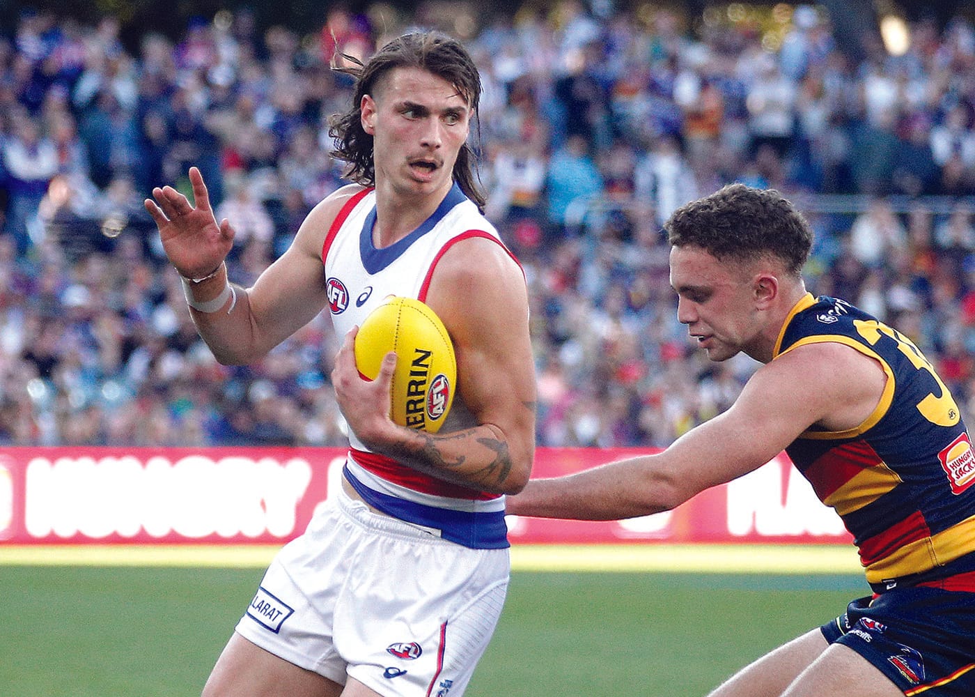 Poulter makes code switch after AFL exit